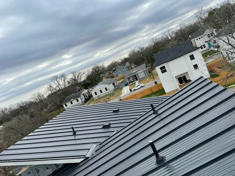 Standing seam metal roof panels with vents for Skylight Repair in Willoughby Hills